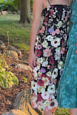 The dress is so beautiful. I received so many compliments. The only critique is that the flowers that are 3D need to be ironed flat as they stick up. I imagine fabric tape would help with that as well. - Alyssa F.