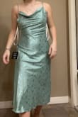 Very pretty but the neckline sits a little weird and was folded over. - Sidney M.