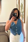 I really love this vest. It's super cute on! If you're in between sizes, size up. I'm typically a small/ medium and I'm really glad I got an M, it fits perfectly and comfortably. - Raquel S.