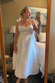 This dress fits true to size but the material feels very cheap and stiff, which makes the dress poof out at the waist. It also seems to have a shorter torso than pictured on the model. Unfortunately, I am unable to return due to final sale. - Samantha A.