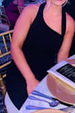 I wore this dress to a black tie wedding and got lots of compliments! It's very simple and elegant and looks really nice with an updo. My only note is that the top is VERY low cut on the one side (like you could see my sticky bra low). I was fidgeting with my dress a lot and ended up pinning the side together so there was more coverage, but once it was pinned I really loved it! - Maggie S.