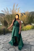 Loved this dress. Wore it to a wedding and got a lot of compliments. It doesn't stretch so make sure you're ordering the right size because it doesn't give in in the slightest. Like some have commented, it was a bit weird/difficult to iron because it folds weirdly, but I managed to make it work and had a really good time. While I don't have really large breasts, they are a little bigger than average and felt a bit tight so if you're heavy chested, size up. I didn't have it hemmed because I didn't mind it dragging a bit in the back, and I wore a tennis shoe on one foot and a cast on the other because I had just injured my ankle. - Betty L.