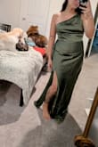 Beautiful dress, fit perfectly. The slit might be a little high for some but I didn't mind it. It has a little stretch and super comfy. Color is also gorgeous! 

Def needs a steam when opening but that's a given due to the packaging. - Christina P.