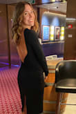 This dress is the epitome of business in the front, party in the back. The mullet of LBD's you might say. It was perfect for a wedding rehearsal dinner where I wanted something sophisticated and a little bit sexy. If you are smaller chested, I would recommend sizing down so that the sleeves stay up on the shoulders (I don't have as much to keep them up). 10/10 recommend :) - Molly S.