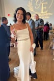 This dress was perfect, the dress needed to be cut and hemmed. We added a notch so the train can be lifted and secured. We also added a crystal belt for a little bling. For the price I paid, this gown is worth the money - Elizabeth P.