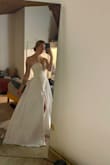 I'm 5'6 142-145lbs and it fits like a glove. I got a size 6 and it's a little tight but I would rather have a strapless dress tight than loose. - Heather N.