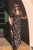 Has a long string inside that, allows you to wraps around your body according to how you liked it fits you. Plunging neck line makes it really sexy yet classy! Has a slight that breaks the flowy long dress that adds more flirtiness and drama! Love it! - Melody M.
