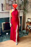My husband's jaw dropped, and my in-laws were totally wowed. At a 300 person wedding I felt completely the best dressed - my husband agreed! Amazing color, unique cut and style. Loved the fabric (it's lined!). The back dips so shapewear might be hard to wear, but the slit is perfect for dancing! - Amanda L.