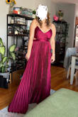 I really liked this dress but I don't think it was perfect for me. It was a little long without heels and the top didn't give much support. The material was good and I really liked the color though! I did end up returning it because of the length and fit so I don't know how it holds up. I'm sure it would work great for someone else. - Erica B.