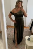 I love everything about this dress and it's exactly as shown in the picture. I received so many compliments as a wedding guest. The velvet material is stretchy and hugs your body like a glove. I'm 5'4 and I had to hem it 2 inches. - Vivi A.