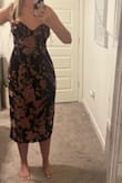 I ordered this dress in a medium and large because of other reviews. The medium fit but only if I'm standing- when I tried to sit it got so uncomfortably tight and it felt like it was going to rip. The large fits and I'm able to tighten the bust by tying it carefully to not rip the fabric. I might have it tailored to take it in slightly on the lower back as it looks and feels too loose there. Pics are with no bra, I plan on wearing a "gather all" brand sticky bra with this dress. - Dylan N.