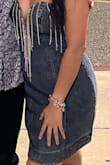I ordered this for a concert! I ordered a small based on the suggestions and it was big. I received it a few hours before my event so I had to take it in a few inches since I did not have time to exchange for a smaller size. I do want to add the back part is very stretchy so that makes it even harder to stay up. Other than the size issue the dress is beautiful. I love the quality and it looked so good. Now I will have it professionally altered. I also loved the color a good shade of jean. - Katia G.