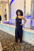 I ordered the black color to wear to a wedding at the end of September. I ordered my normal size L and it hugged my body perfectly. The material is thick and good for the beginning of fall weather. It is long but I wore heels a few inches high so that helped it not drag. 1 star off as the slit is high for me personally, it gets higher when you sit. - Michelle B.
