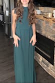 This dress is good quality and true to size, but the material is on the thin side, which makes it look a bit less elegant/elevated than I was hoping for. It is a lined dress, though. It hangs nicely and is the perfect length for me (5'9") with short heels. The slits on either side are a nice height and make walking super easy! - Kyra T.