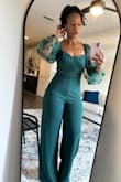 This jumpsuit was a hit at the wedding. I received so many compliments. The fit was true to size. I have a pear shaped build and the stretchy fabric fit beautifully. - Neke C.