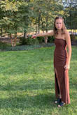 Fits snug, but how you would want it to!  I really like this dress however the slit is not sewed so where the slit ends it is not sewed closed so there is really no security in that area. I did not like that so I had my grandmother sew it about 6 inches. After that, I loved wearing it! - Mackenzie J.