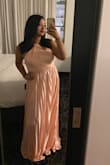 The material is great! Since I am short, the dress was a little bit large but with heels on it was perfect. I'm a size M and it fitted perfectly. (the pic is from when I tried it on.) - Mariela C.