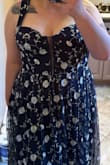 The top of the dress is unstructured leaving a large gap between the dress and my chest. - Jessica C.