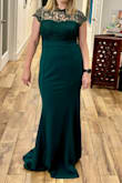 It is a pretty great dress, but I think I need to order down a size as this cut of dress is not for my figure.  The green is nice, the lining is a bit too big so it kept bunching so Id have to smooth it and that for me was the nail in the coffin so back it goes. - Michelle A.