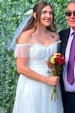 I carefully chose to order this dress after months of searching online and am so happy with my choice! The only thing is it was a little loose, so maybe sizing down or altering it would have given it a better fit. I wore a white corset top underneath. - Stefani C.