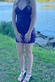 It was gorgeous and perfect, the only thing is that the sequins scratched the sides of my arms so they got irritated after a while. But it was so pretty and I loved it. - Mallory U.