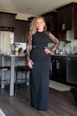 I LOVE this dress! I felt classy and sexy.
As a pear shaped girl, I feel like I'm forever in between sizes. A large probably would have gaped in the back on the sides by my lats (armpits) since I have B cup size boobs. 
The cut outs are so cute and I love that's open back but doesn't dip too low so I could still wear some spanx. - Tayhler M.