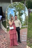 I loved this dress! The dress ran a little big but I think if I would have sized down it would've been too tight. I had to use double sided tape to hold the top part into place on both sides and it worked well! - Katie R.