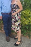 The dress was very cute in person!  It fit great and I received a lot of complements.  Bought it for a wedding that we attended.  The fabric was comfortable, was a medium weight and the top had a bit of stretch but the bottom was a bit less. - Dusty G.