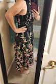 The dress is really cute in person.  It fit nicely on me and I had issues with multiple dresses and my chest. The back is sheer on the top with a cute bow, which is really cute. - Dusty G.