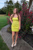 Absolutely loved this dress. The color is gorgeous, very bright - almost neon - yellow. The flower detail in the stitching is so pretty. It was nice to find a dress that wasn't too short and looked classy on my teenage daughter.
Loved everything about this dress on my daughter for her homecoming dance. - Sarah E.