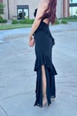 Fits beautifully. Although the material is very high quality, it makes it heavy and since it's strapless you have to pull it a bit. Beautiful dress though, love the slit on the side. - Cristina G.
