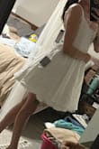 Add a petticoat and thank me later. Zipper at the waist seam is difficult simply because the fabric is so thick there on either side. I am a little scared I might break it but flipping it to the front, like I do to clasp a difficult bikini, to zip it does help. So so cute!
Ps. It looks less like a nighty, in my opinion, on a shorter person like myself. - Ceara P.