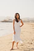 I wore this dress for my beach photoshoot, the dress was the perfect choice for that. The length and fitting was true to size. Only thing the zipper on the side was sew in a way it was popping out, but can't see it in the pictures. - Vaish P.