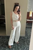 Absolutely loved the way this two piece fit and was perfect for the concert I purchased this for. However the zipper got stuck after an hour or two in the outfit and no matter what my friends and I tried, it would not unzip. Thankfully the material had enough stretch that I could squeeze out, but the pants were ruined. Definitely would have worn this again if it had held up better! - Amberley C.