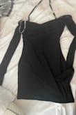 The dress fits alright but is a little small for my tastes, the size is smaller than the medium I am used to. The neckline is covered in ugly, hard-to-hide white hanger strings that seem to have been put on at the last minute. If it weren't a final sale I would have returned the dress. - Lauren D.