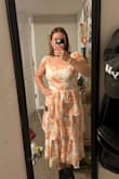 I loved this dress so much!! I felt so pretty and feminine in it. the shoulder straps were a little loose but otherwise, it fit like a glove! - Millie D.