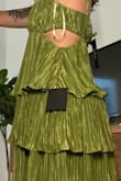 I almost ordered a medium and glad I didn't. The dress was very loose around the top and didn't flow the same as the photos. I wouldn't size down because it would then be too short. Looked fine taking a photo but felt so loose - Caroline W.