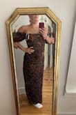 I am typically a size large in Lulus dresses with some wiggle room. This dress is stunning and looks just like the pictures, but is way too tight in the hips and a bit loose at the top. The tightness of the hips makes it difficult to sit or dance so I will be returning since it is not feasible to wear to a wedding. I am not a particularly curvy girl so I don't usually have this issue. Super bummed that it doesn't fit because I love the design. - Polly H.