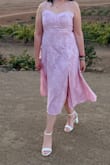 This dress was beautiful and comfy! I'm usually a L but went with the XL just to play it safe. Length and style of the dress were perfect for a hot wedding! - Zaira A.
