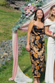 Received many compliments. The dress is timeless in every way. Straps are adjustable which was so helpful. I will be wearing it again for another upcoming wedding this fall. - Izzy F.