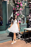 I wore this dress to my bridal tea party and I got so many compliments! it has a slip underneath & a slip in the upper back so you can see any undergarments. it was very comfy and so so cute! - Madison G.