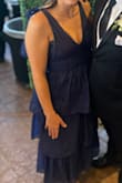 This was the perfect dress for a wedding guest. I received so many compliments on this dress from the color, to the fabric, to the fit. I would recommend this to anyone! - Lacie S.
