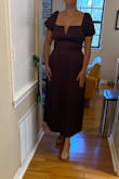 I ordered my usual M first and couldn't zip it around my ribs even though the waist fit ok. I returned the M for a L and have to make do because I need a dress ASAP, but it really doesn't fit like I hoped. It's very long in the skirt (to my ankles) and still pretty tight in the ribs. The sleeves are also not as puffy as they seem in the picture. If you have any bust at all, you're going to have a lot of cleavage showing. And yet it still looks kind of matronly. - Grace D.