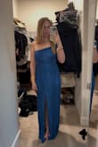 This dress isn't very flattering and did nothing for my body. I'm an S and based on reviews I ordered an XS which ended up being the perfect size, however, the shoulder area was way too tight and I can imagine it becoming uncomfortable. The dress didn't accentuate my curves and was still dragging on the floor even when I put heels on (I'm 5'3"). Like other reviews said, the stitching gets a bit lumpy in some places. Has a lot of potential to be a beautiful dress if it was made slightly different. - Heather C.