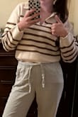 The pullover fits perfectly and is very soft. Though it is a bit cropped, it matches almost all kinds of waisted pants - Marie S.