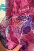 I saw the other reviews saying this dress ripped, but it was so pretty I still bought it. I wore it around the house a bit and it was okay but the outer fabric did rip at the wedding I was attending. Luckily I had a jacket to cover it up because it looked so embarrassing. - Zoe B.
