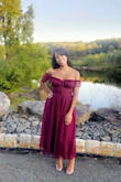 This dress was better than expected. Great style. It was nice to do something besides the form fitting and curtain looking dresses out there. I am very happy with [this] purchase. It was true to size and I didn't feel self-conscious at all! - Raquel N.