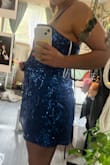 Was way too big even though I chose the size closest to my measurements. The bust was almost cowled, the waist was way too loose and the loops to tie up the back are held on by a thread and when I tighten them they pucker up and make weird bumps on the back. This is my last homecoming as a senior and I am very upset. I tried to exchange it for a different size but it would come almost a week after my dance. - Sierra S.