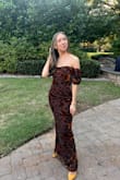 This dress is SO pretty! It is definitely long so I had to wear heels but im sure you could get it hemmed if you aren't a heel girly. I wore it to a fall wedding and toted around my 9mo all night and was totally comfy in it. I also forgot my strapless bra so thankfully with the boning in the bust it stayed up fine!! Though it was a little loose on my tiny bust lol. Can't wait to find something else to wear it to - Jordan D.