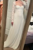 Love the look of this one though I will be having another layer added under the skirt just because I don't like how thin it is and shows every little line/bump. Otherwise perfect I picked this one to wear for my elopement! - Brittney C.